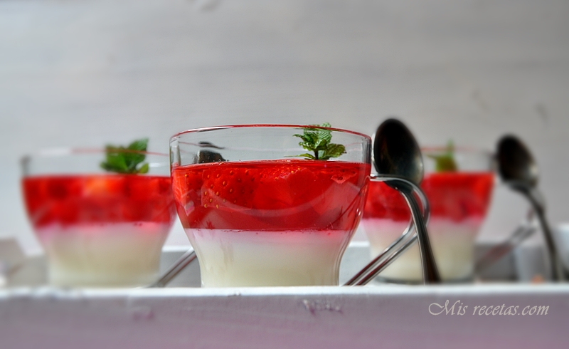 Cups of curd with strawberry jelly